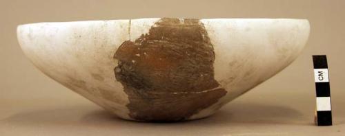 Ceramic bowl, tapered body, flat base, mended & mostly reconstructed