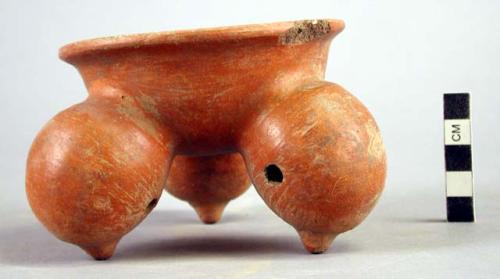 One pottery tripod bowl, red ware