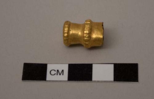 Small gold mace head. Fluted on top & shoulder