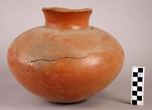 Restored red pottery jar