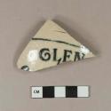 Blue transfer printed stoneware body sherd, with "GLEN" stamped on it