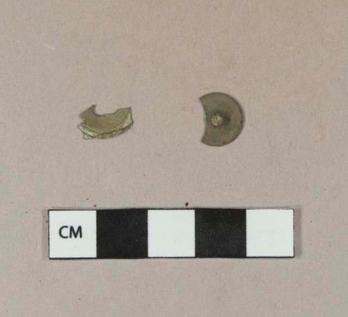 Copper alloy button components; one cover and one back with fragment of shank