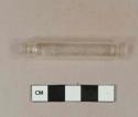 Colorless glass vial or pill bottle