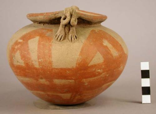 Pottery jar, with handle in shape of human figure