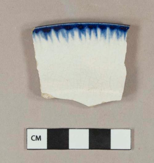 Blue shell edge whiteware rim sherd