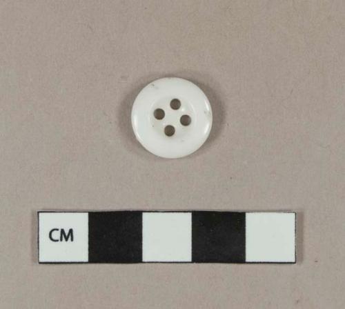 White four hole porcelain prosser button, dish shape