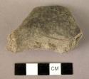 Fragment of pottery ansa lunata handle with plastique warts in saddle