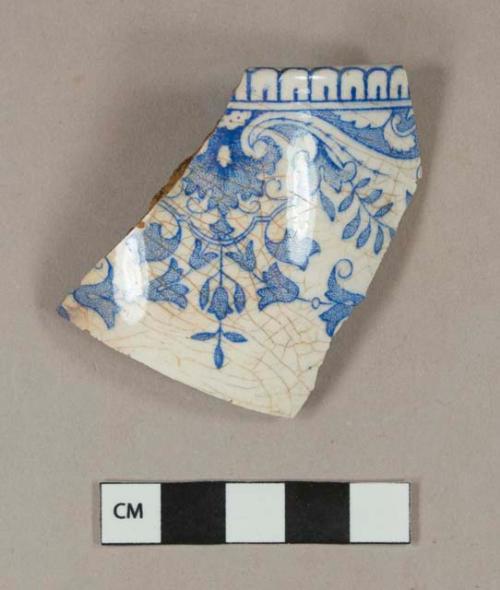 Blue transfer printed whiteware rim sherd