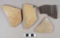 Tan salt-glazed exterior stoneware vessel body fragments, dark brown slip glazed interior, buff paste, 1 fragment with cobalt decoration