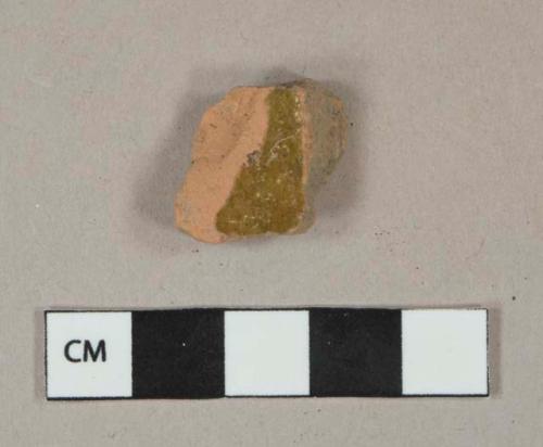 Brown lead glazed redware vessel body fragment