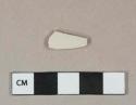 Undecorated white salt-glazed stoneware vessel body fragment, white or light gray paste