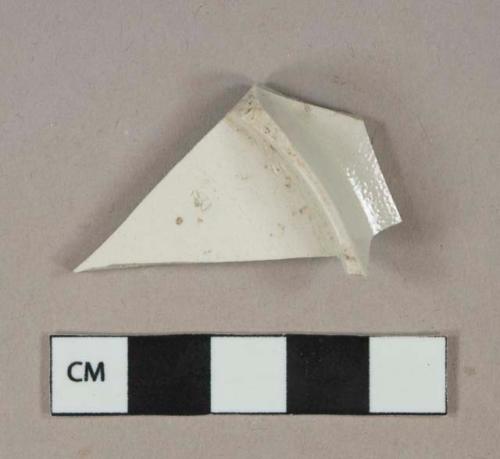 Undecorated white salt glazed stoneware vessel body fragment, light gray or white paste