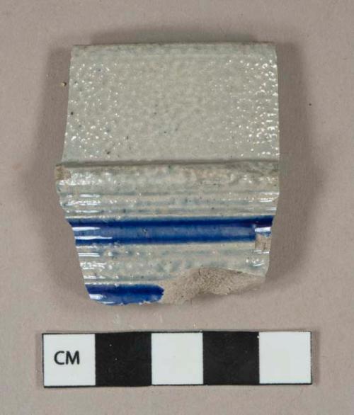 Gray salt glazed stoneware vessel rim fragment with cobalt lead glaze decoration, gray paste, Westerwald type