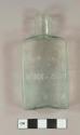 Glass, mold-blown; rectangular aqua, bottle. Hinge mold bottle with open pontil scar; embossed on one broad side with "R. B. Dacosta / Philada". Embossed on one narrow side with "West Indian" and on the other narrow side with "Toothwash".