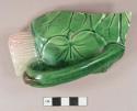 Green and pink molded majollica rim and handle sherd