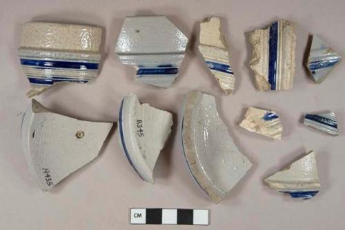 Gray salt-glazed stoneware vessel body, base, and rim fragments, cobalt banded decoration, gray paste