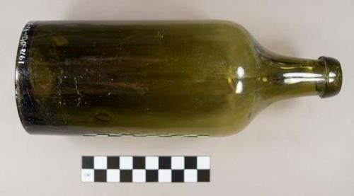 Intact olive green glass bottle, mold seam, oil finish, embossed on base "Friedrichshall C. Oppel & Co."