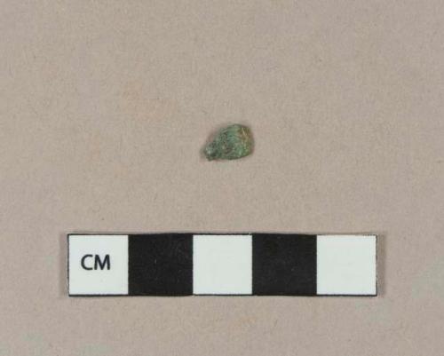 Molded copper alloy fragment, possibly fragment of a button cover