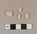 Undecorated white salt glaze stoneware rim sherds; two sherds crossmend