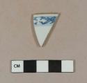 Blue hand painted porcelain rim sherd with brown glazed rim