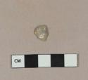 White metal object fragment, possible button cover