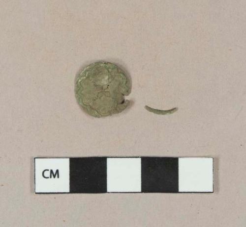 Stamped copper alloy button cover fragments