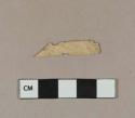 Carved bone fragment; possible fan strut