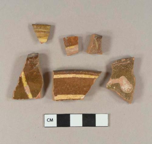 Slip decorated lead glazed redware rim sherds