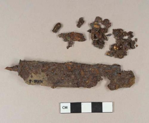 Iron knife fragment; iron fragments that have fallen off the original object