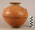 Pottery jar, )( ornaments on side