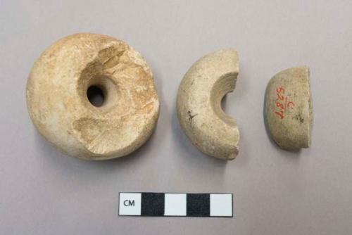 Fragments of large stone beads