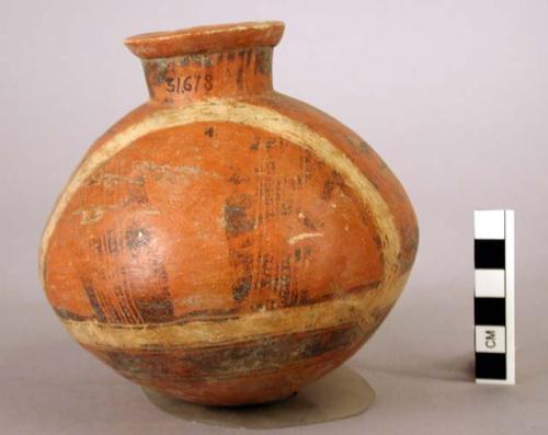 Pottery jar, red, with white band and black ornamentation