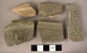 Fragments of globular pottery amphorae - corded, incised and dimpled decoration