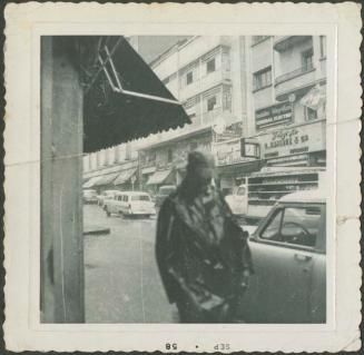 Photograph album, Yaruro fieldwork, p. 1, photo 1, man on urban street