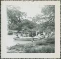 Photograph album, Yaruro fieldwork, p. 3, photo 3, boat on the river with Yaruro