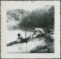 Photograph album, Yaruro fieldwork, p. 3, photo 4, man in canoe on the river