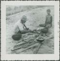 Photograph album, Yaruro fieldwork, p. 22, photo 5, people cooking