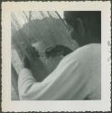 Photograph album, Yaruro fieldwork, p. 28, photo 1, close view woman weaving