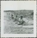 Photograph album, Yaruro fieldwork, p. 36, photo 2, constructing a building, notching poles
