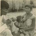 Photograph album, Yaruro fieldwork, p. 43, photo 1, woman breastfeeding