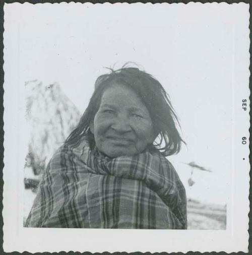 Photograph album, Yaruro fieldwork, p. 45, photo 3, woman with a plaid blanket