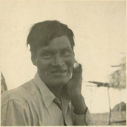 Photograph album, Yaruro fieldwork, p. 46, photo 1, man smiling