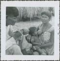 Photograph album, Yaruro fieldwork, p. 51, photo 1, woman breastfeeding