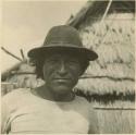 Photograph album, Yaruro fieldwork, p. 56, photo 1, man posing in hat