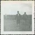 Photograph album, Yaruro fieldwork, p. 58, photo 3, man in black outdoors