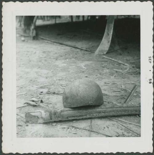 Photograph album, Yaruro fieldwork, p. 60, photo 4, decorated object leaning on stick