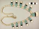 Shell "depression necklace" with shell and turquoise pendants