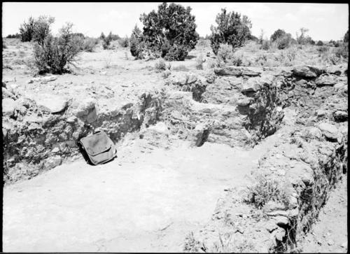 Site 106, Room 6, showing firepit, looking west.