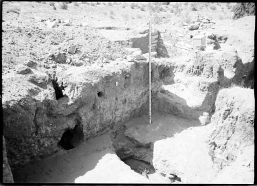 Site 107, Room 10, showing firepit and flue, looking S.