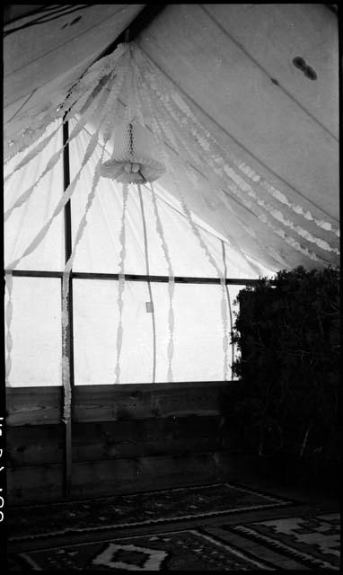 Pottery tent decorated for Brew wedding, shows bell.